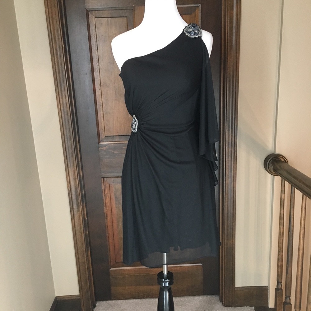 Black one-shoulder appearance dress